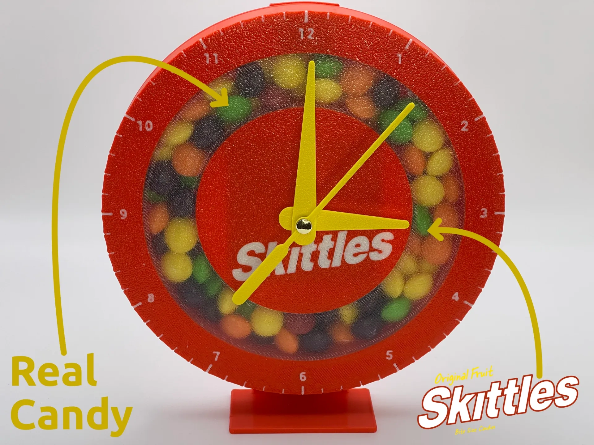 Spitting Clocks Skittles Filled Clock 来自 MalcTheOracle - MakerWorld