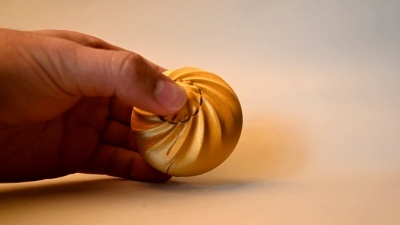 包“赚”  蒸蒸日上小金包（可转陀螺）