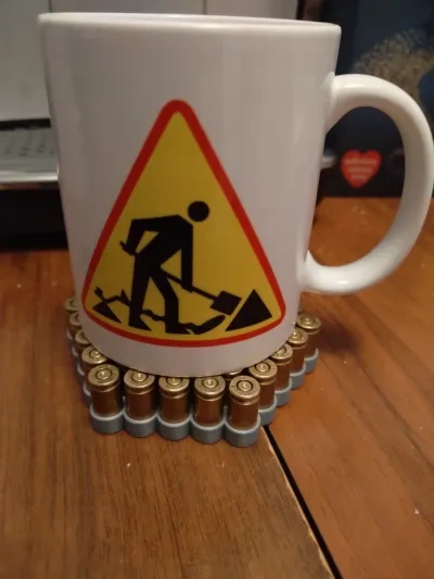 9毫米，.40弹药外壳杯垫，适用于咖啡或啤酒。